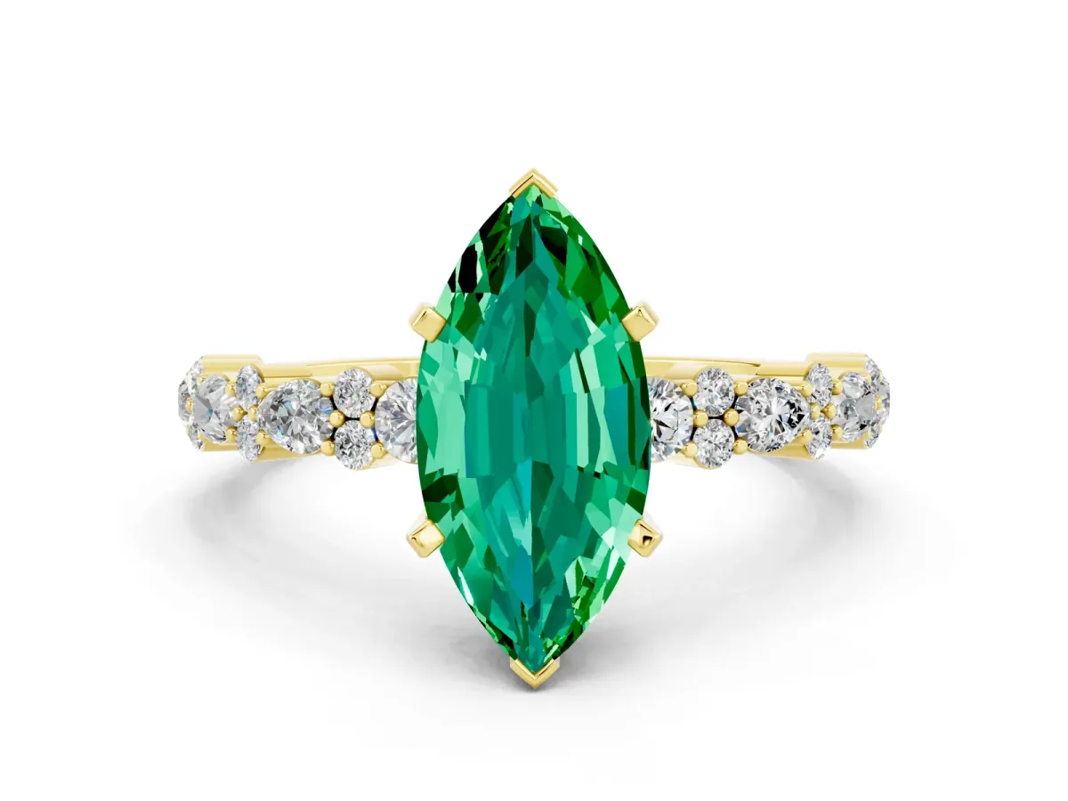 Marquise Cut Emerald Side Stone Solitaire Ring with Round and Four-Prong Setting Yellow gold