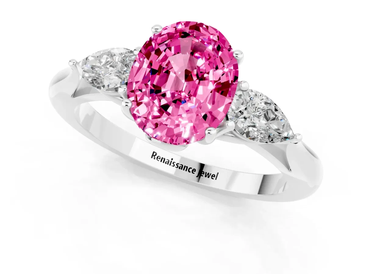 Three-Stone Oval Cut Pink Sapphire Ring with Pear Side Stones in Four-Prong Setting White gold