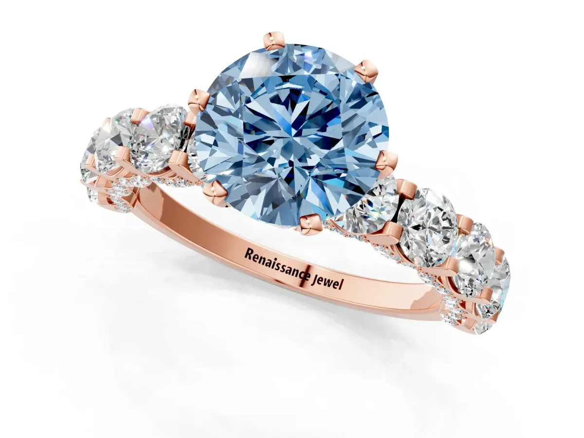 Fancy Blue Round Cut Diamond Side Stone Engagement Ring with Four-Prong Setting Rose gold