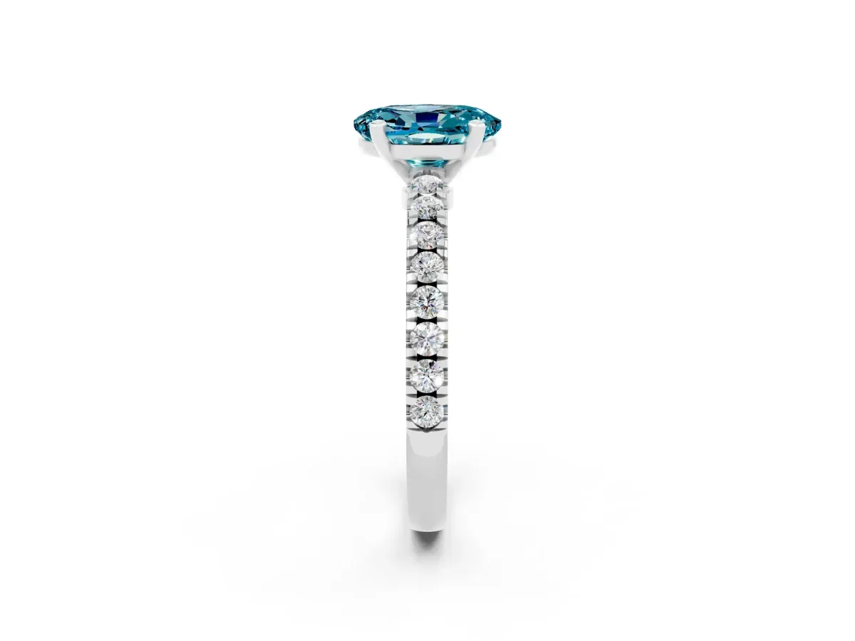 Oval Cut Solitaire Blue Topaz with Pavé Band and Four-Prong Setting Silver