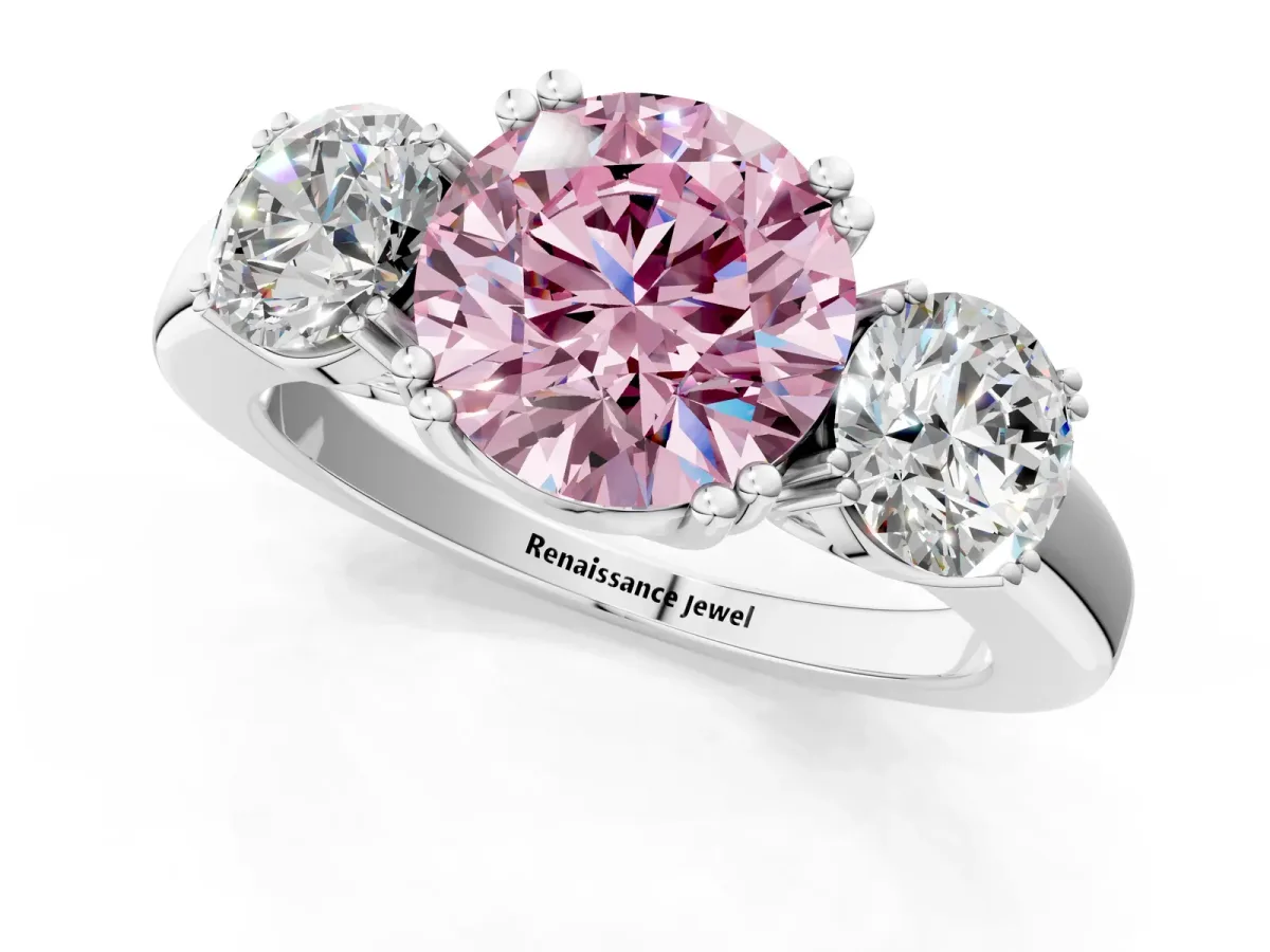 Fancy Pink Three-Stone Round Cut Cut Diamond Ring with Channel Set Band and Four-Prong Setting Silver