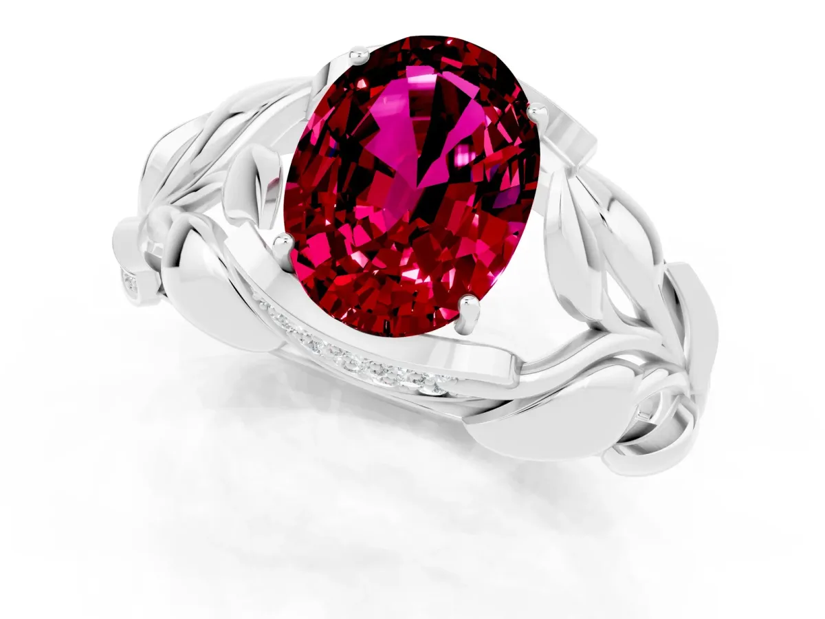 Oval Cut Garnet Leaf-Inspired Engagement Ring with Round Accents and Prong Setting Platinum