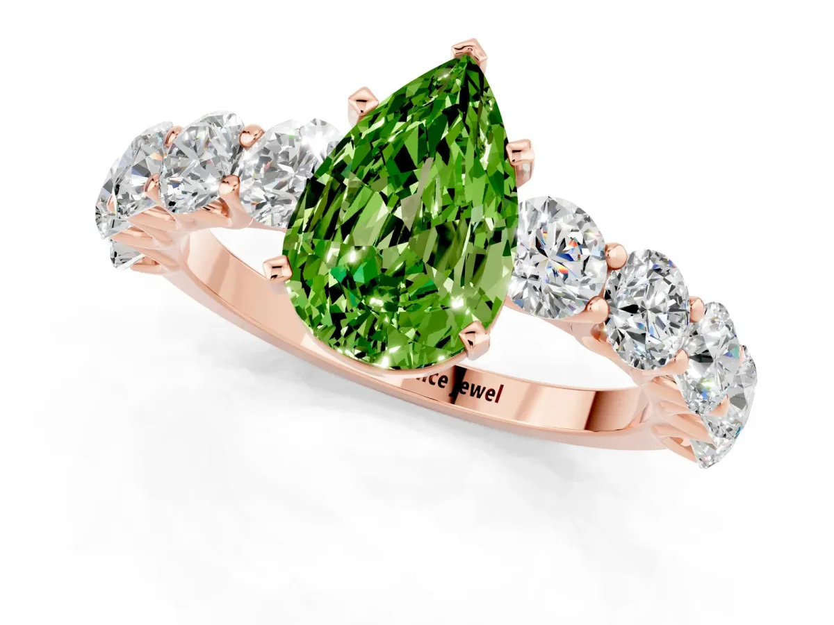 Pear Cut Peridot Prong Setting with Side Stones on a Pave Band Rose gold