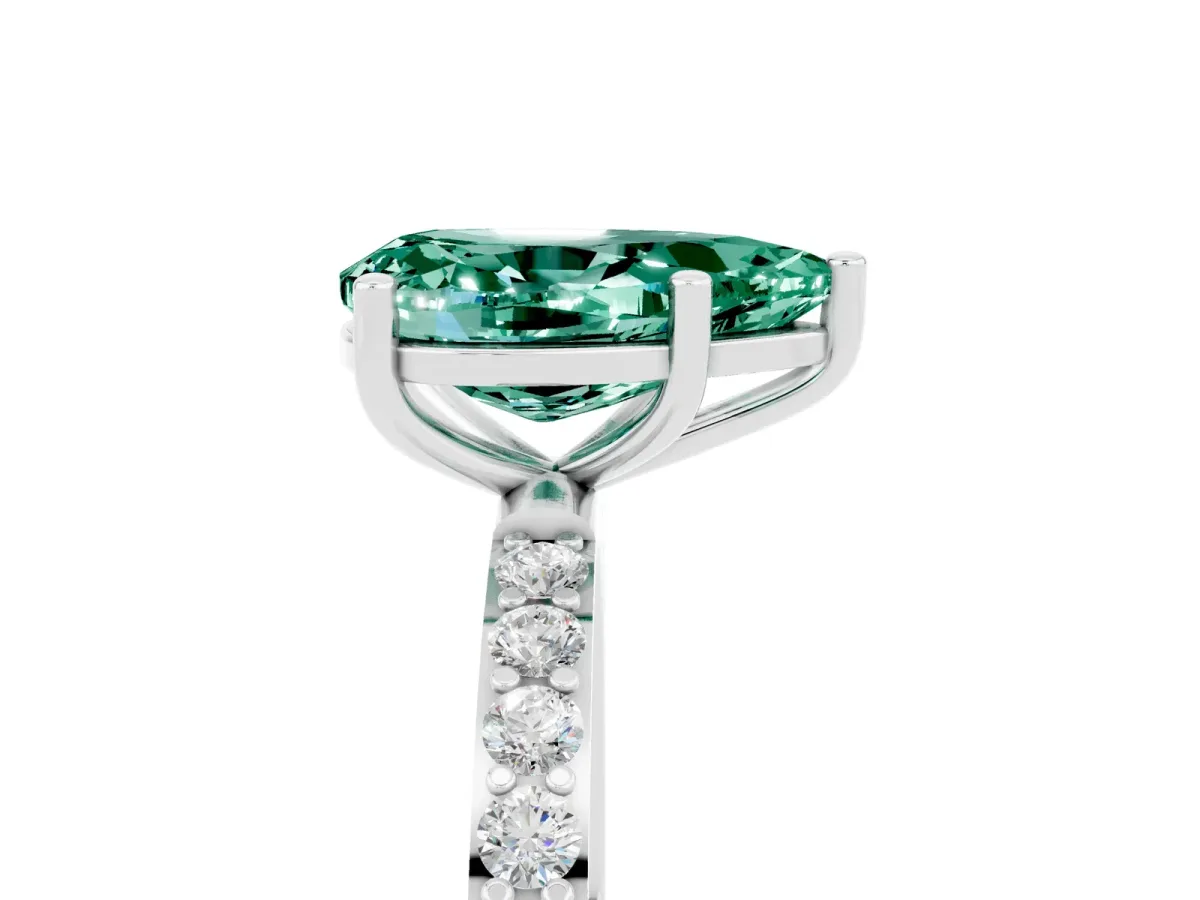 Pear Cut Green Sapphire Solitaire Ring with Round Pavé Band and Prong Setting Silver