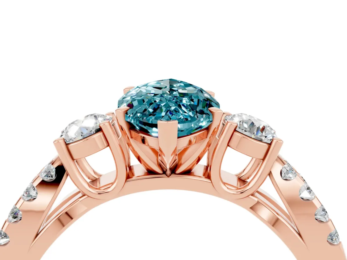 Marquise Cut Blue Topaz Three-Stone Ring with Pavé Split Shank and Four-Prong Setting Rose gold