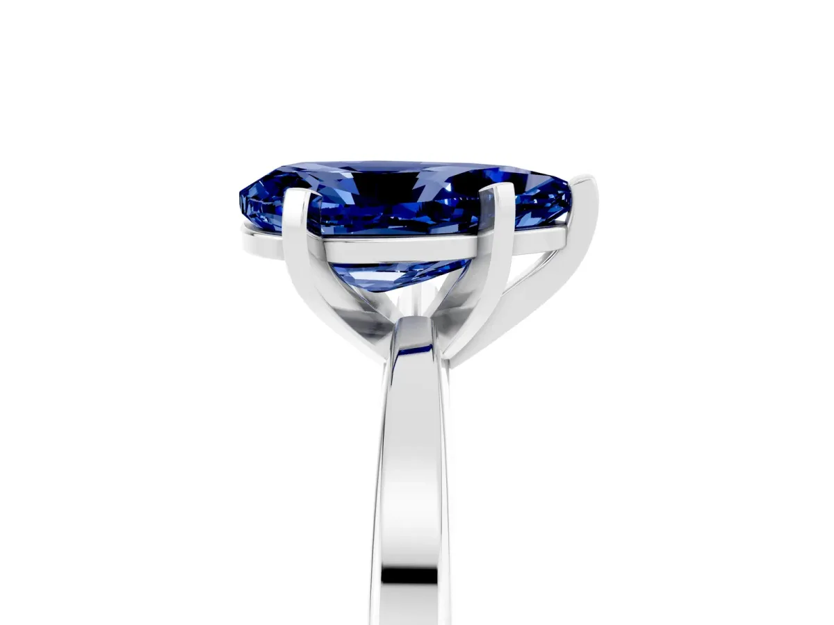 Pear Cut Blue Sapphire Solitaire Engagement Ring with Classic Band and Four-Prong Setting Silver