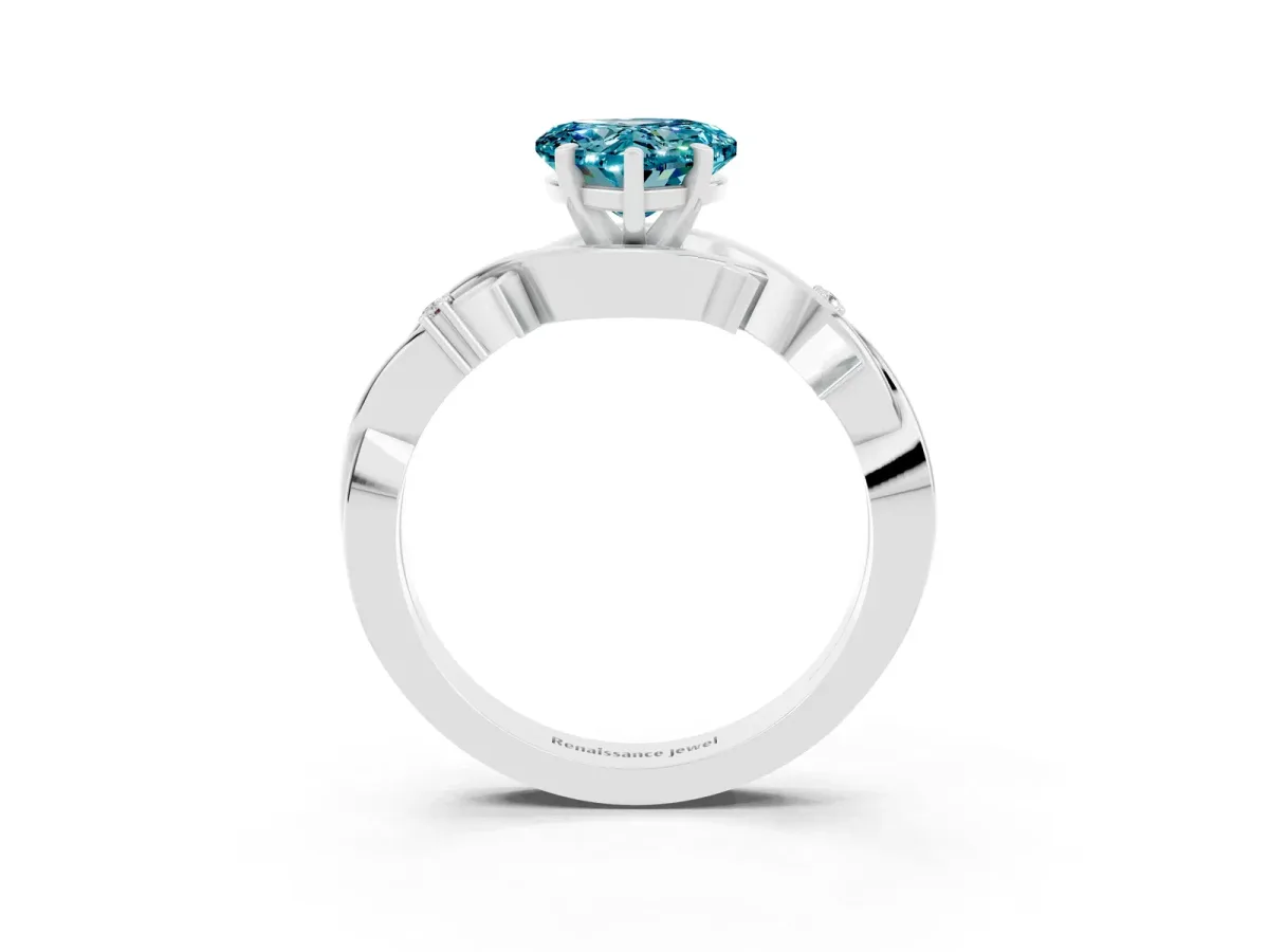 Heart Cut Blue Topaz Solitaire Ring with Twisted Band and Prong Setting Silver