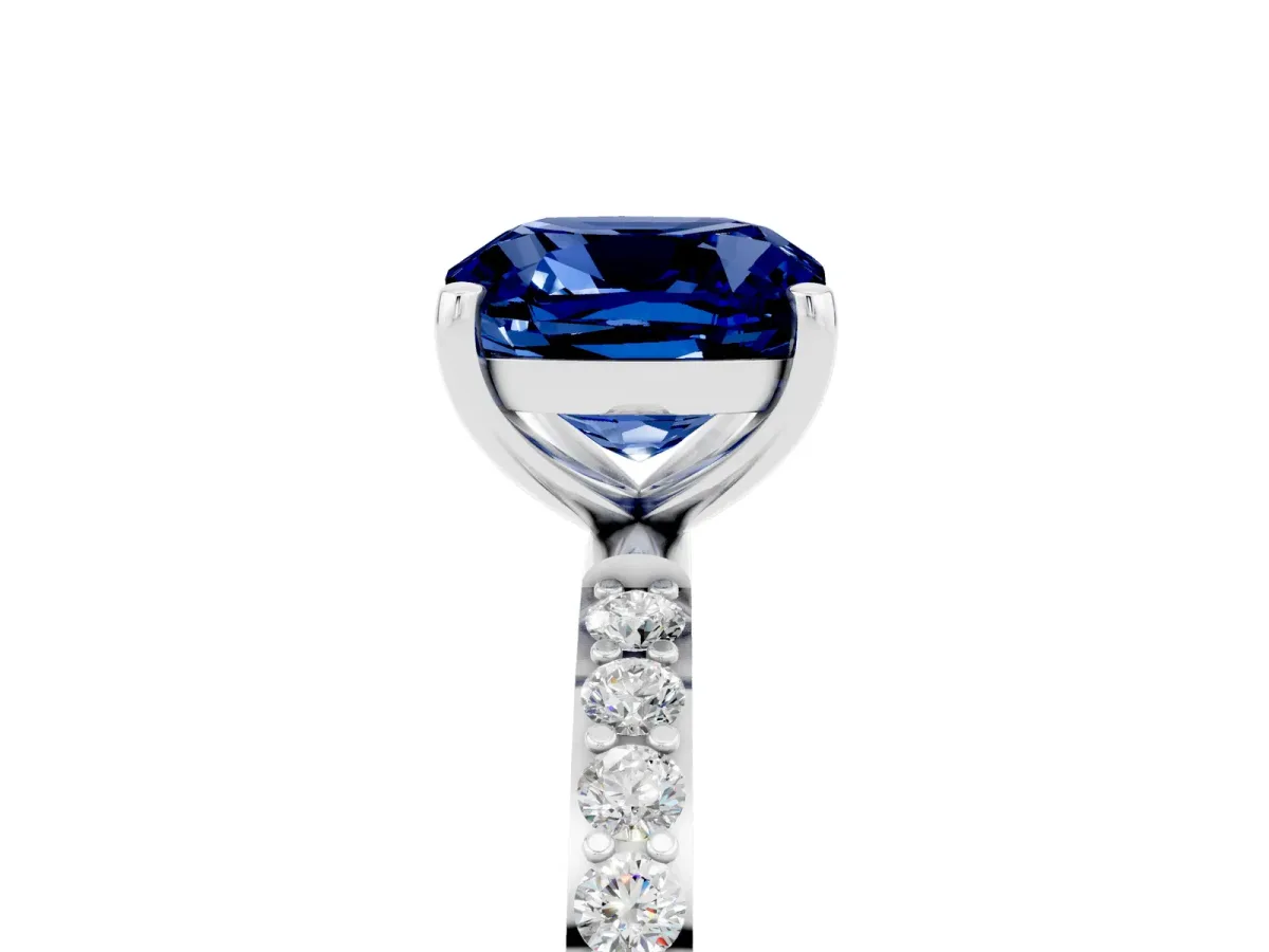 Cushion Cut Blue Sapphire Solitaire Ring with Round Pavé Band and Prong Setting Silver