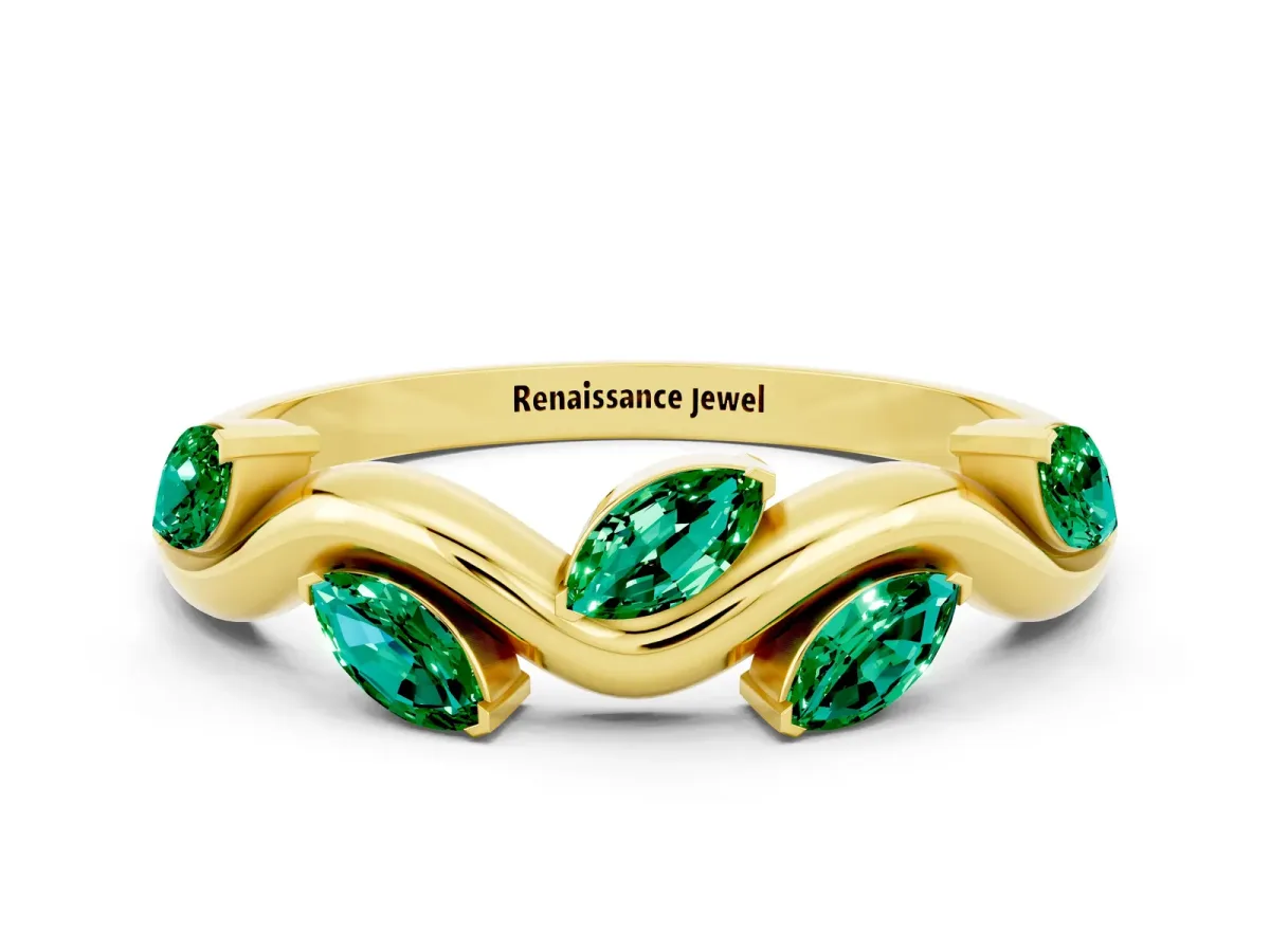 Marquise Emerald Twisted Band with Prong Setting Yellow gold