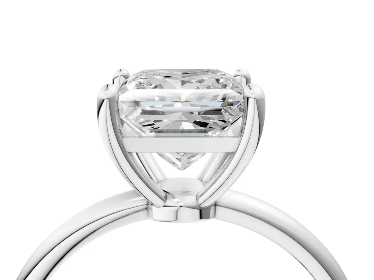 Princess Cut Solitaire Diamond Ring with 4-Prong Setting on a Classic Band Silver