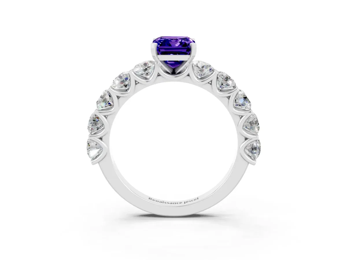 Emerald Cut Tanzanite Prong Setting with Side Stones on a Pave Band Platinum