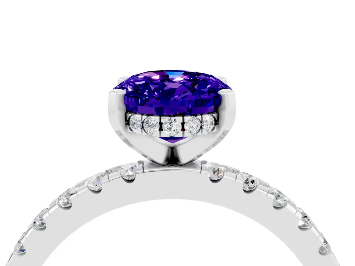 Oval Cut Tanzanite Solitaire Ring with Round Pavé Band and Four-Prong Setting Silver