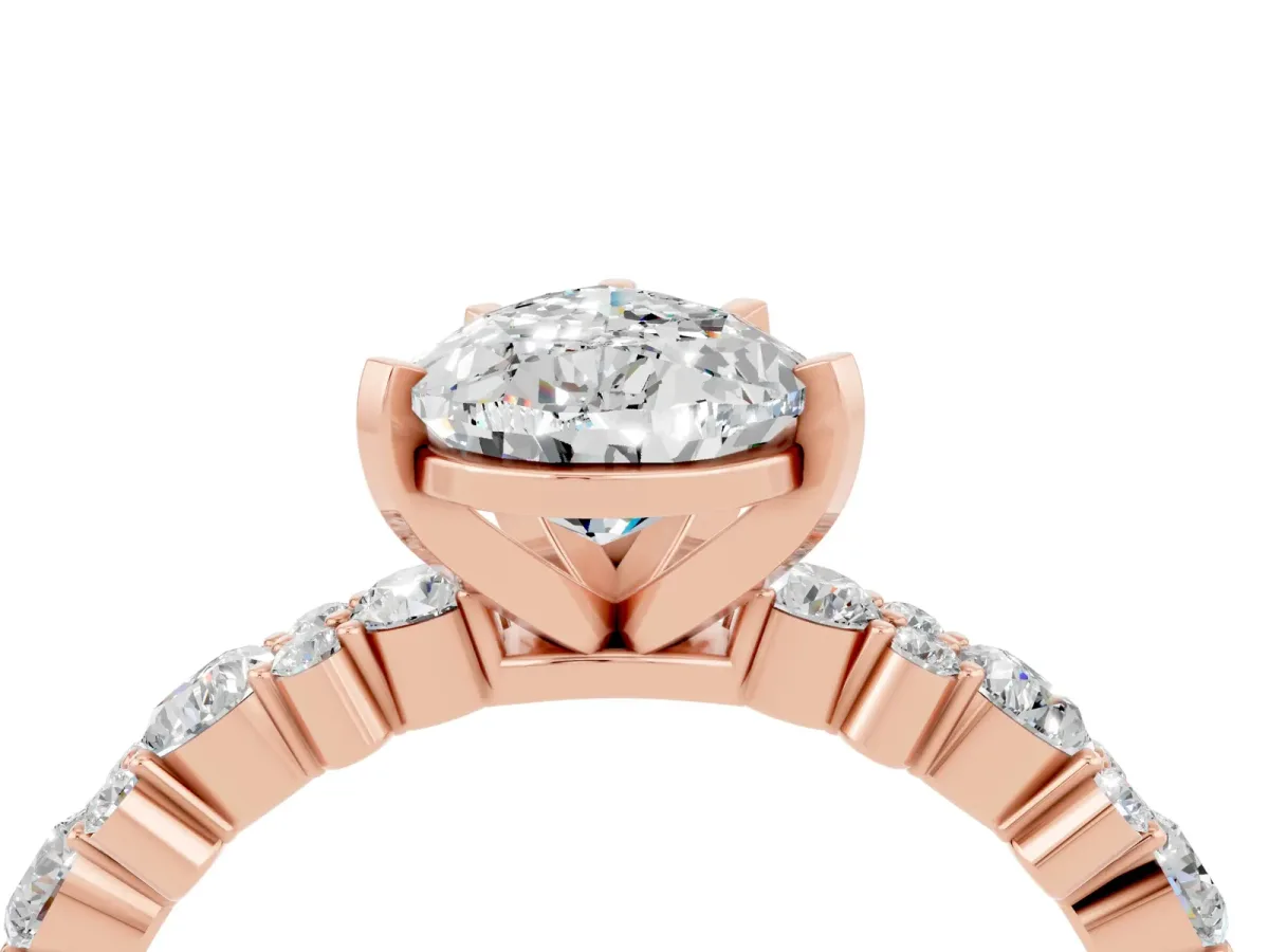 Pear Cut Moissanite Side Stone Solitaire Ring with Round and Four-Prong Setting Rose gold