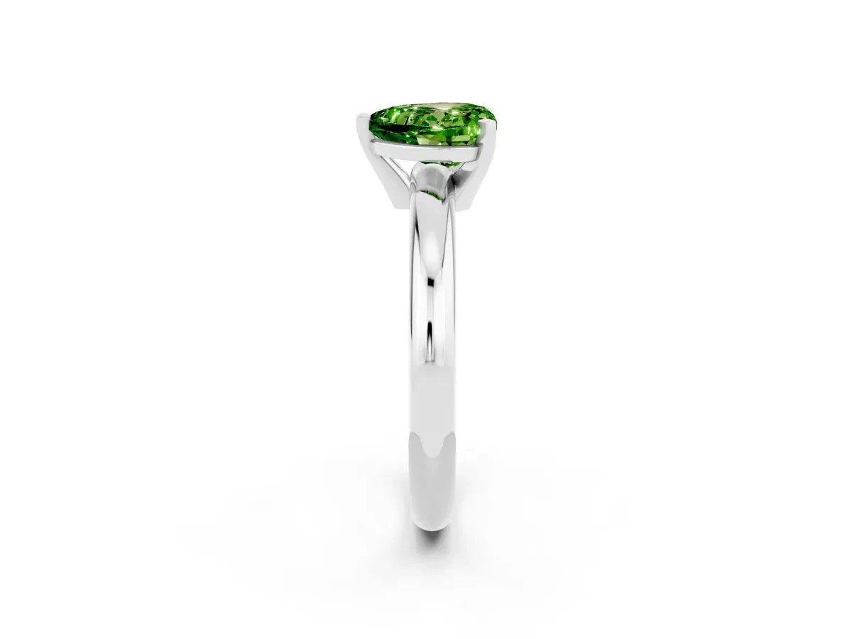 Heart Cut Peridot Solitaire Engagement Ring with Round Band and Four-Prong Setting Silver