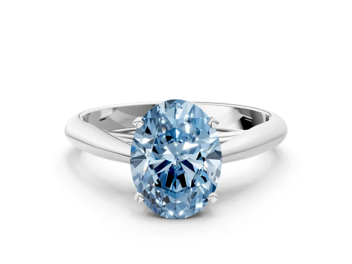 Fancy Blue Oval Cut Diamond Solitaire Engagement Ring with Cathedral Setting and Four-Prong Mount White gold