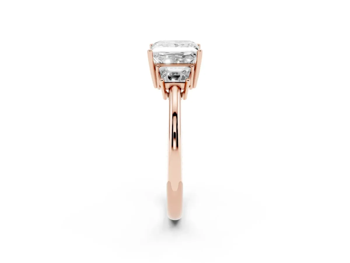 Princess Cut Diamond Three-Stone Ring with Trapezoid Side Stones and Prong Setting Rose gold