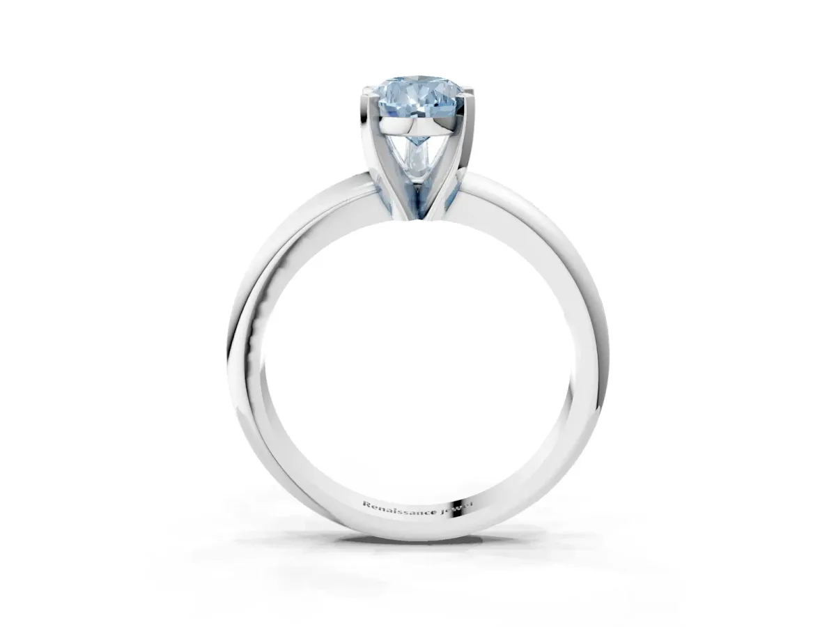 Fancy Blue Pear Cut Diamond Solitaire Engagement Ring with Round Band and Four-Prong Setting Silver