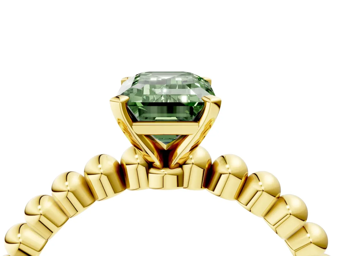 Fancy Green Emerald Cut Diamond Solitaire Ring with Beaded Band and Prong Setting Yellow gold
