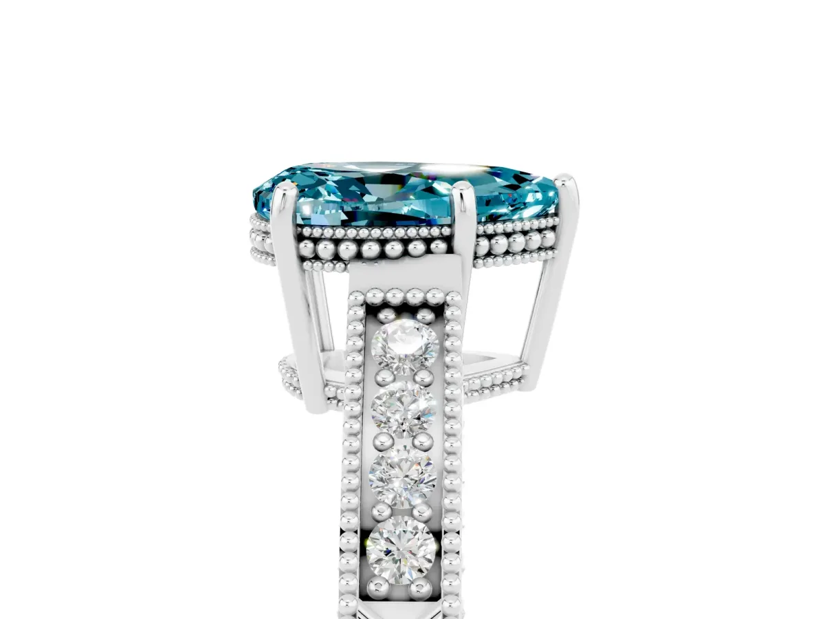 Pear Cut Blue Topaz Ring with Milgrain Pavé Band and Four-Prong Setting Platinum