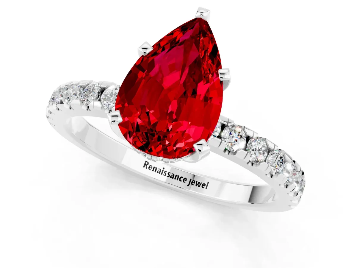 Pear Cut Ruby Solitaire Ring with Round Pavé Band and Four-Prong Setting Platinum