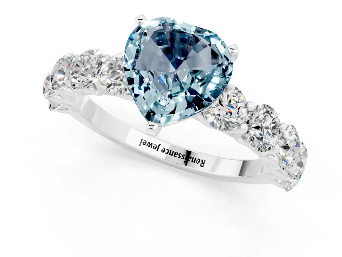Heart Cut Aquamarine Prong Setting with Side Stones on a Pave Band Silver