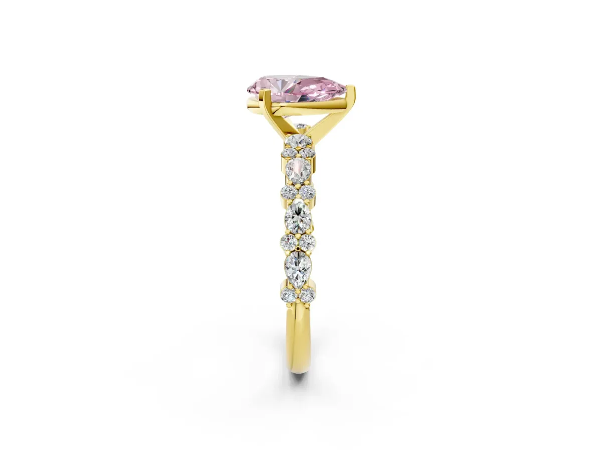 Fancy Pink Pear Cut Diamond Side Stone Solitaire Ring with Round and Four-Prong Setting Yellow gold