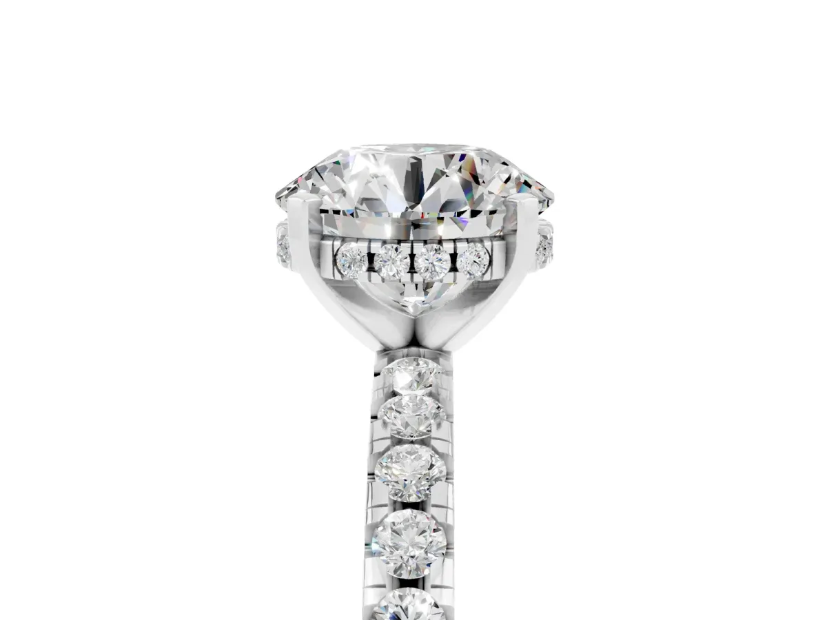 Round Cut Moissanite Solitaire Ring with Round Pavé Band and Four-Prong Setting Silver