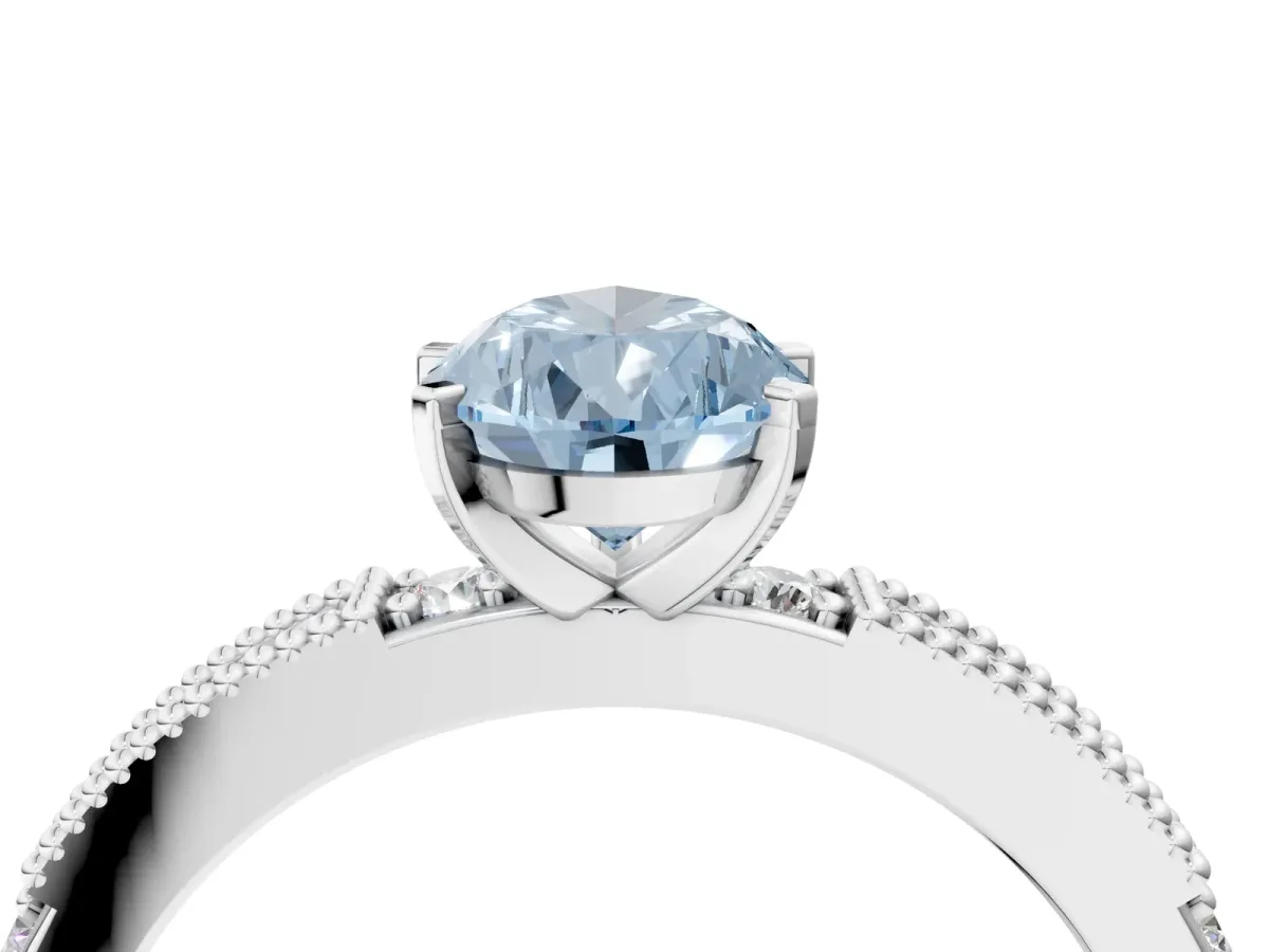 Fancy Blue Pear Cut Solitaire with Pavé Band and Four-Prong Setting Platinum