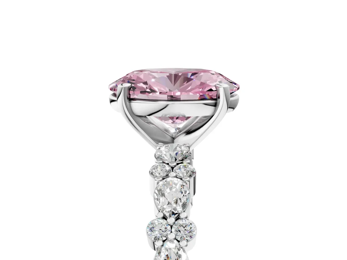 Fancy Pink Oval Cut Diamond Side Stone Solitaire Ring with Round and Four-Prong Setting Platinum