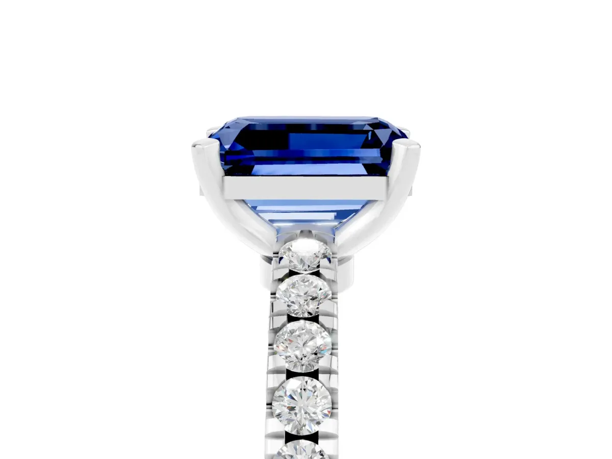Emerald Cut Solitaire Blue Sapphire with Pavé Band and Four-Prong Setting Silver