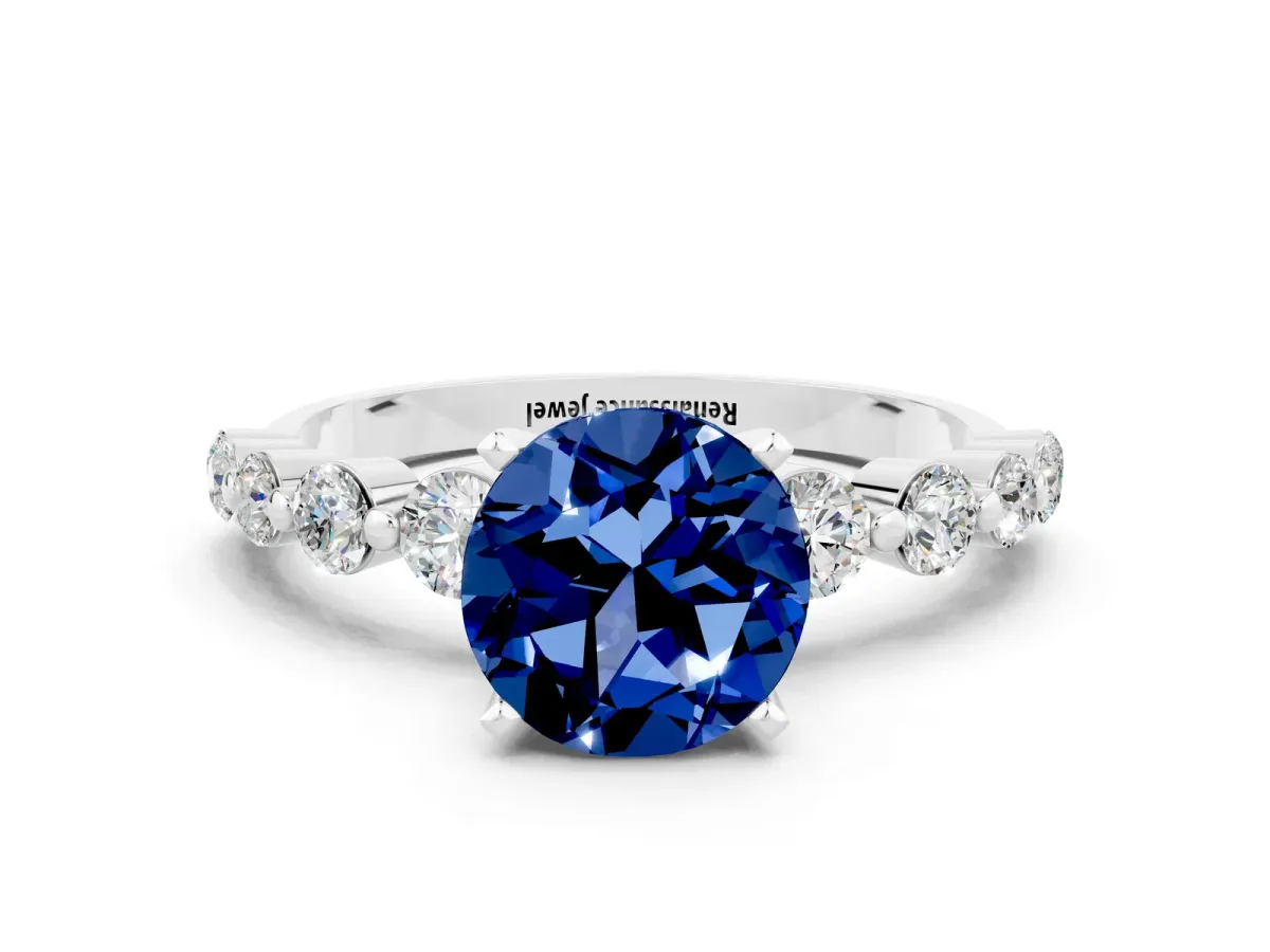 Round Cut Solitaire Blue Sapphire Ring with Pave Band and Four-Prong Setting Silver