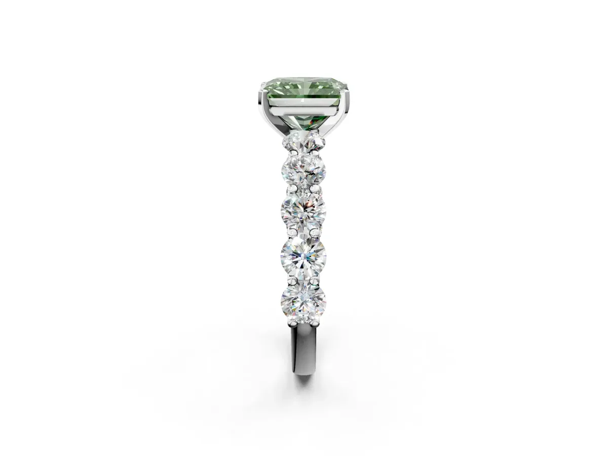 Fancy Green Radiant Cut Diamond Prong Setting with Side Stones on a Pave Band Silver