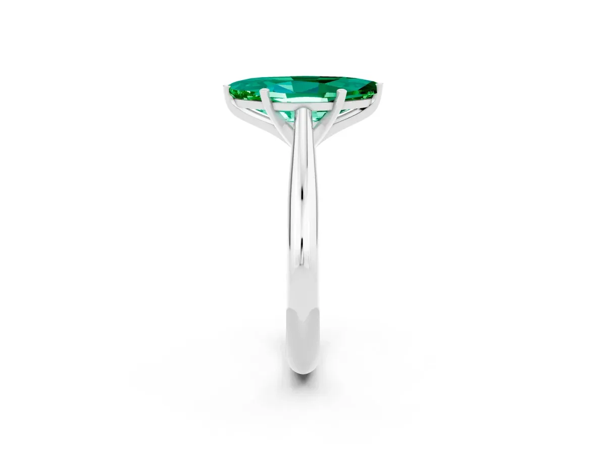 Marquise Cut Emerald Solitaire Engagement Ring with Cathedral Setting and Four-Prong Mount White gold