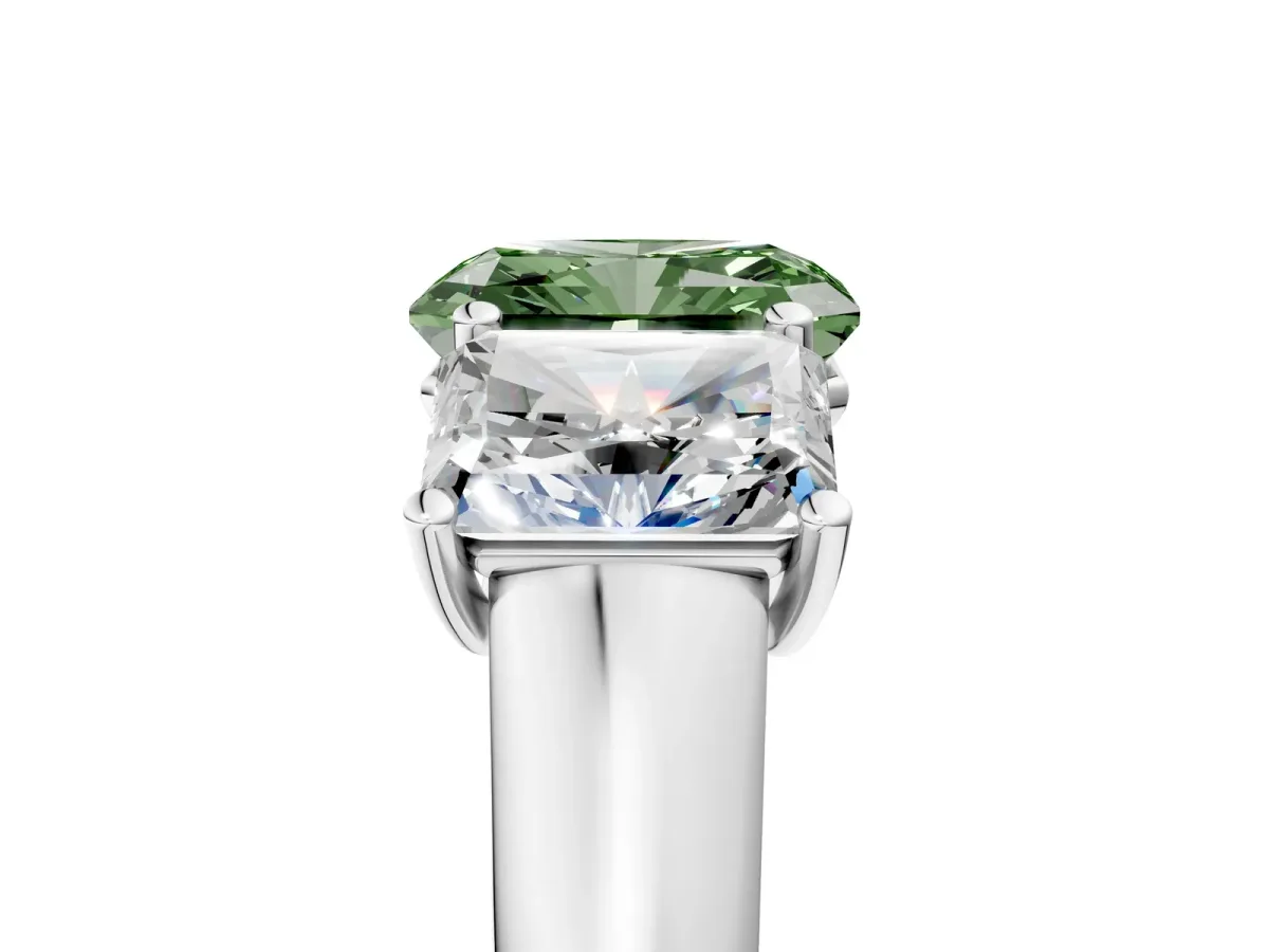 Fancy Green Radiant Cut Three-Stone Diamond Ring with Prong Setting on a Classic Band Platinum