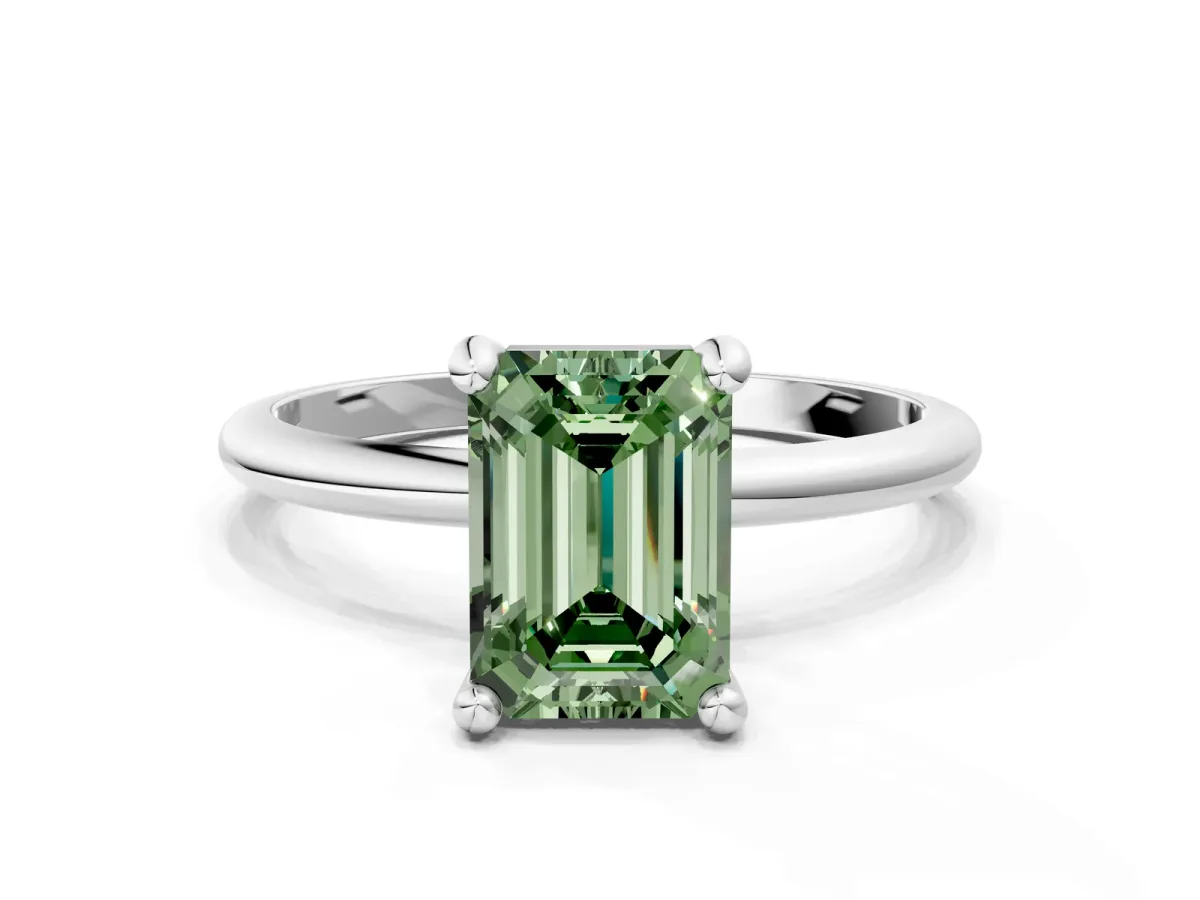 Fancy Green Emerald Cut Solitaire Diamond Ring with 4-Prong Setting on a Classic Band Silver