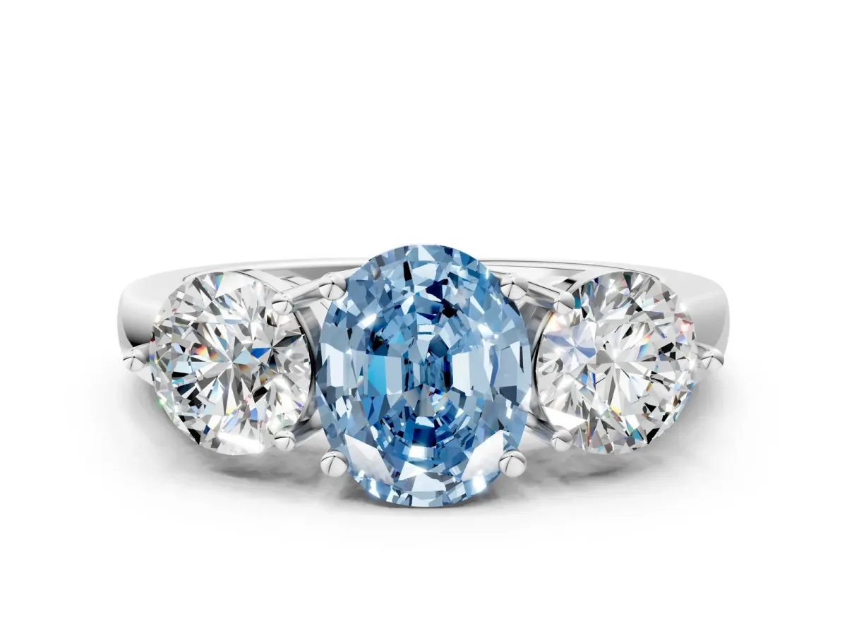 Fancy Blue Oval Cut Diamond Three-Stone Ring with Prong Setting and Classic Band White gold