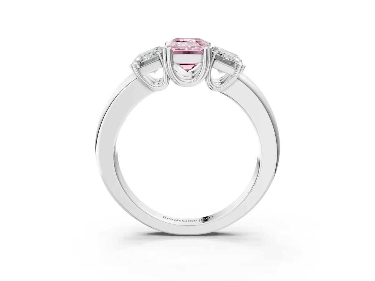 Fancy Pink Three-Stone Emerald Cut Cut Diamond Ring with Channel Set Band and Four-Prong Setting Silver