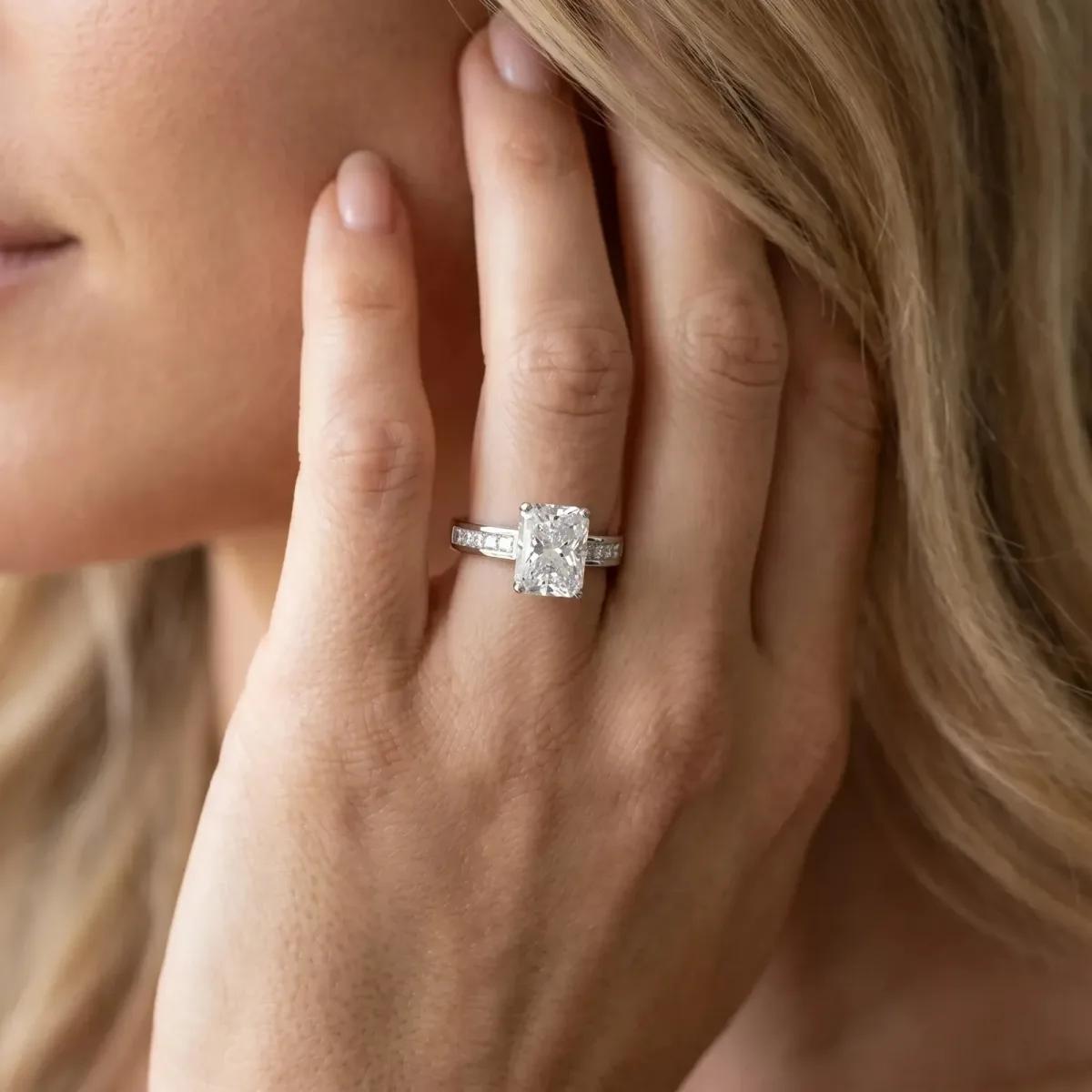 Radiant Cut Solitaire Diamond Ring with Channel-Set Band and Four-Prong Setting Platinum