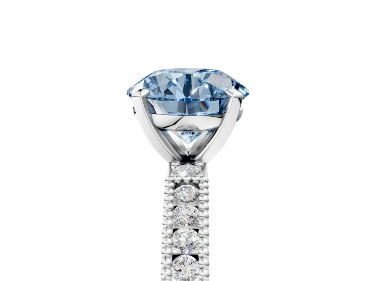 Fancy Blue Round Cut Solitaire with Pavé Band and Four-Prong Setting Platinum