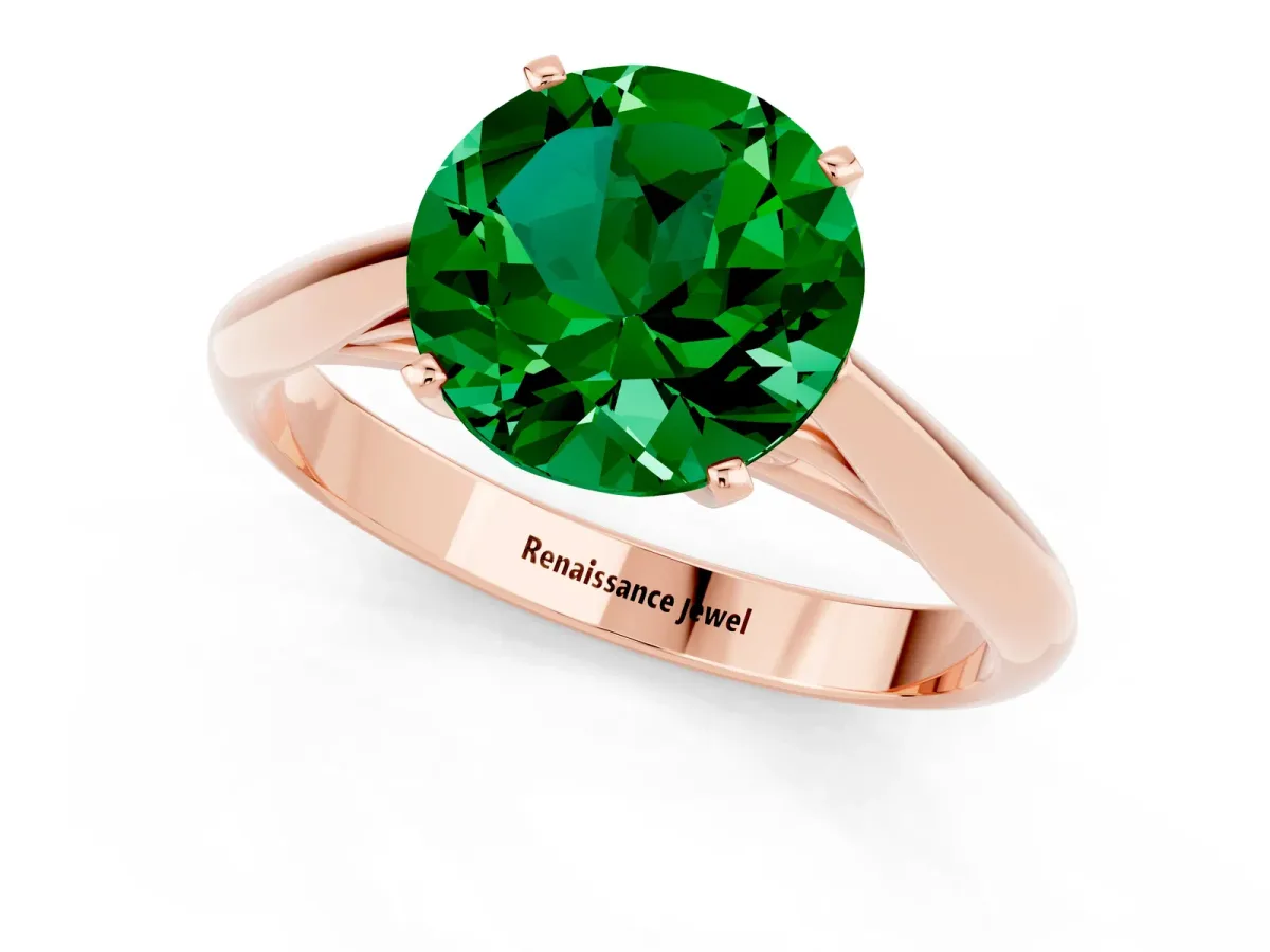 Round Cut Emerald Solitaire Engagement Ring with Cathedral Setting and Four-Prong Mount Rose gold