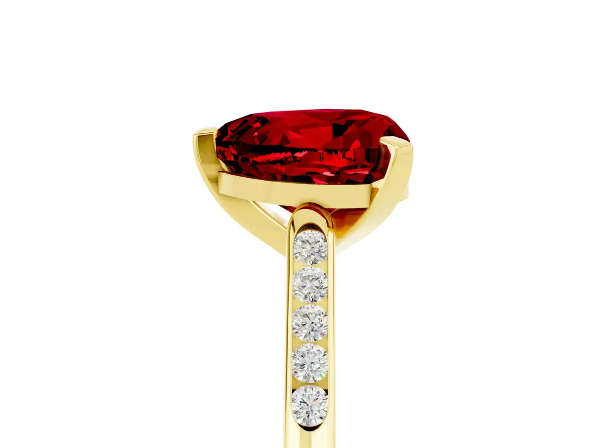 Heart Cut Ruby Solitaire Ring with Channel Set Round Band and Prong Setting Yellow gold