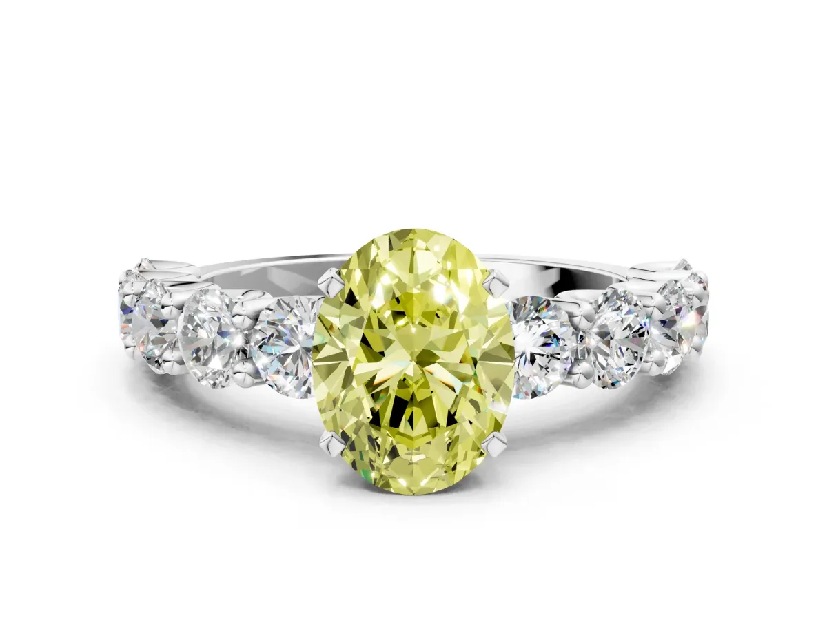 Fancy Yellow Oval Cut Diamond Prong Setting with Side Stones on a Pave Band Platinum
