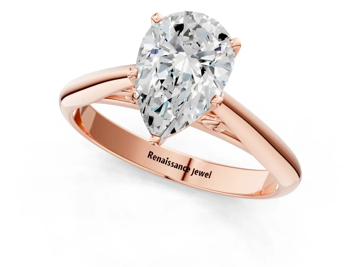 Pear Cut Diamond Solitaire Engagement Ring with Cathedral Setting and Four-Prong Mount Rose gold
