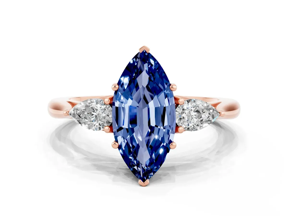 Marquise Cut Blue Sapphire Three-Stone Ring with Pear Side Stones and Prong Setting Rose gold