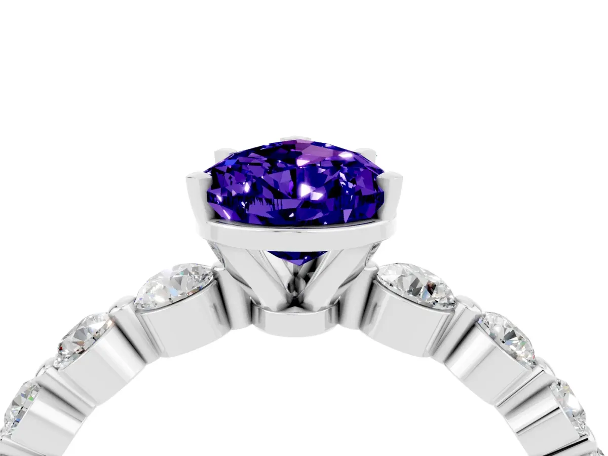 Pear Cut Solitaire Tanzanite Ring with Pave Band and Four-Prong Setting Platinum