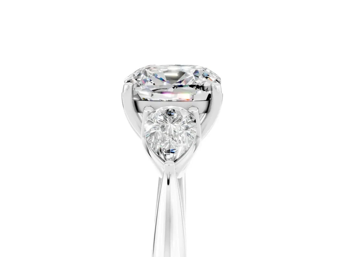 Three-Stone Cushion Cut Moissanite Ring with Pear Side Stones in Four-Prong Setting White gold