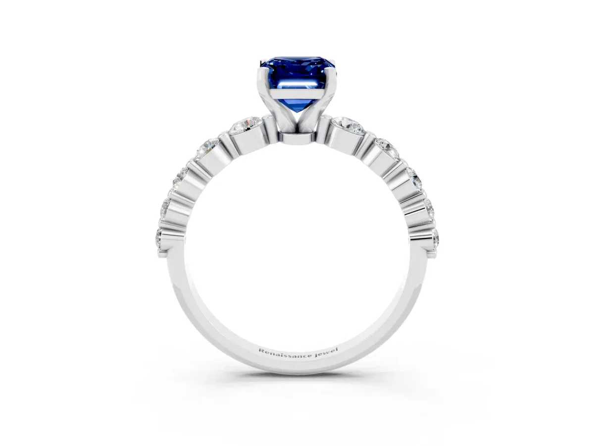 Emerald Cut Solitaire Blue Sapphire Ring with Pave Band and Four-Prong Setting Silver