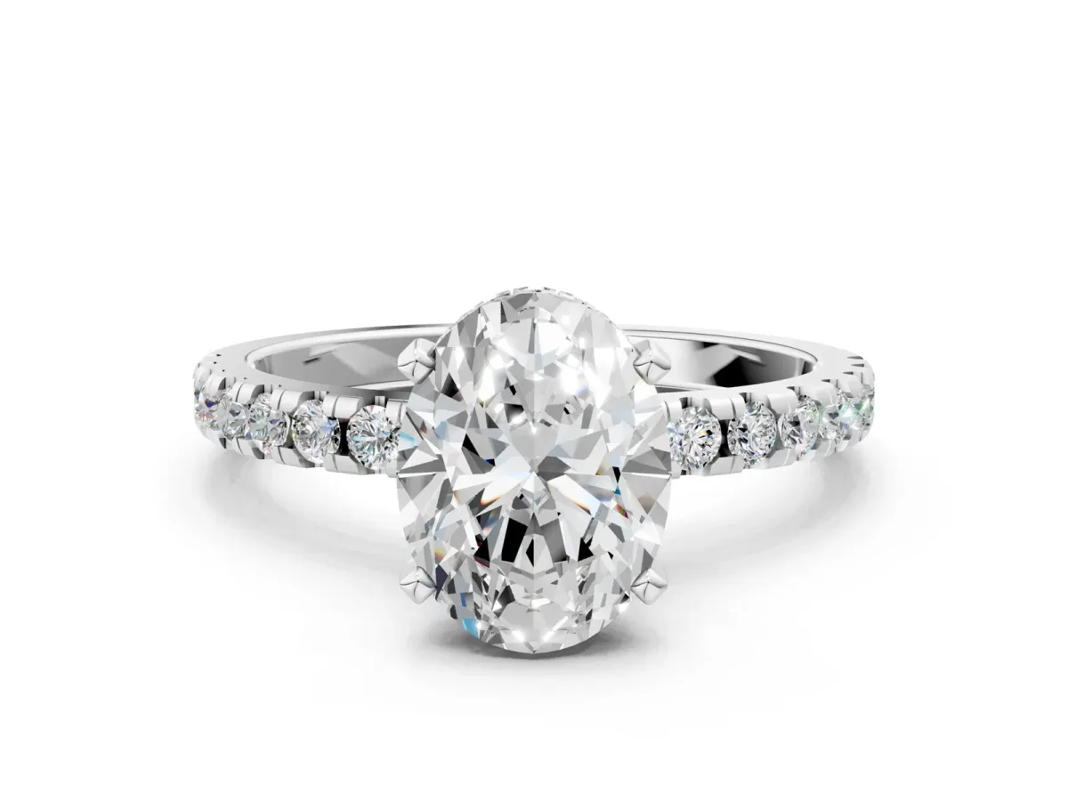 Oval Cut Diamond Solitaire Ring with Round Pavé Band and Four-Prong Setting Silver