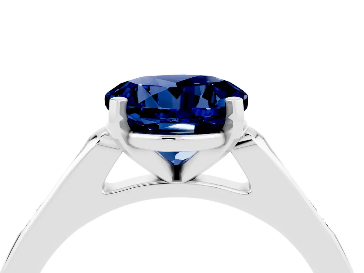 Round Cut Blue Sapphire Solitaire Ring with Channel Set Round Band and Prong Setting Silver