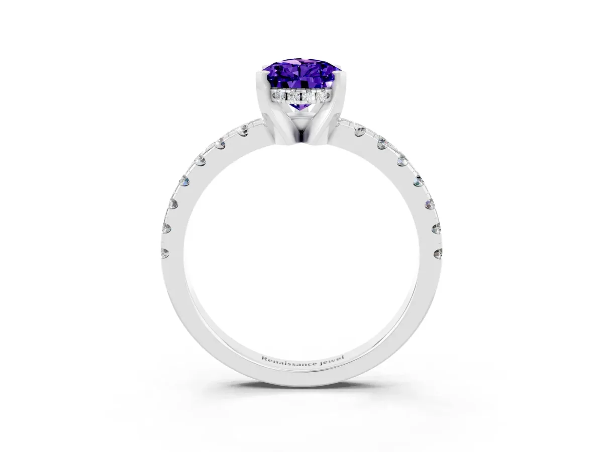 Pear Cut Tanzanite Solitaire Ring with Round Pavé Band and Four-Prong Setting Silver